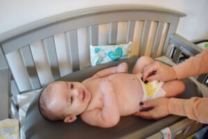 Changing diaper new born kids