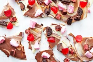 Christmas rocky road slab filled with Oreos, marshmallows, and Cherry Ripe