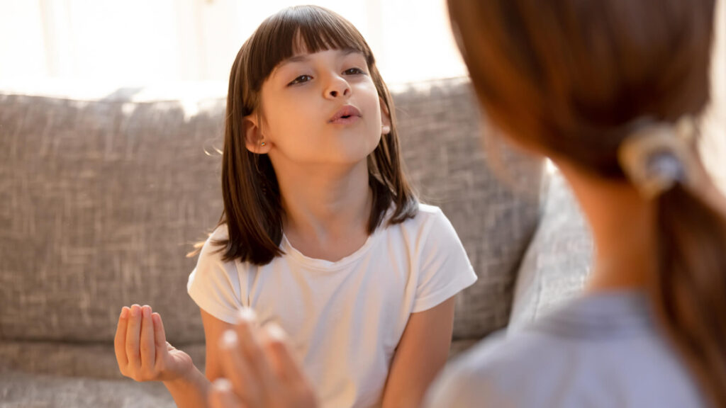 toddlers playing with mother